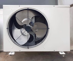 Compressors grid.Close up compressor air conditioner.electric fan on white background