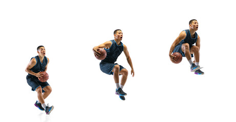 Fototapeta na wymiar Tensioned. Young basketball player of team training in action, motion in jump of step-to-step goal isolated on white background. Concept of sport, movement, energy and dynamic, healthy lifestyle.