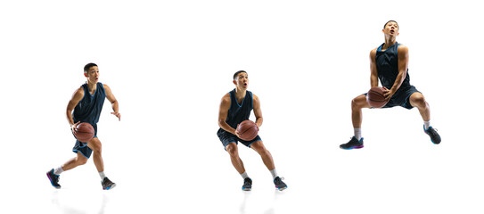Flying. Young basketball player of team training in action, motion in jump of step-to-step goal isolated on white background. Concept of sport, movement, energy and dynamic, healthy lifestyle.