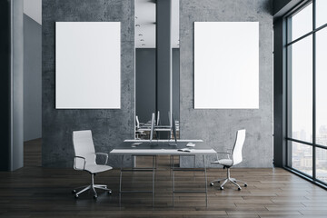 Concerete coworking office hall with two empty banners