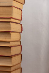 Background with piled up old books. Culture concept