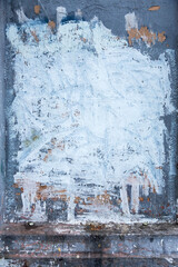 Background texture wall with peeling old paint. Old wooden background with remains of pieces of scraps of old paint on wood. Texture of an old tree, board with paint, vintage background peeling paint