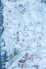 Background texture wall with peeling old paint. Old wooden background with remains of pieces of scraps of old paint on wood. Texture of an old tree, board with paint, vintage background peeling paint