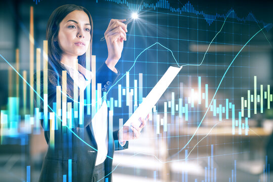 Businesswoman holding paper and drawing stock charts