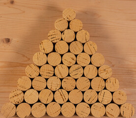 Cork stoppers for wine bottles arranged neatly and geometrically for commercial, brand and...