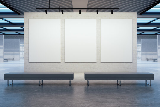 Minimalistic gallery interior with three empty banners