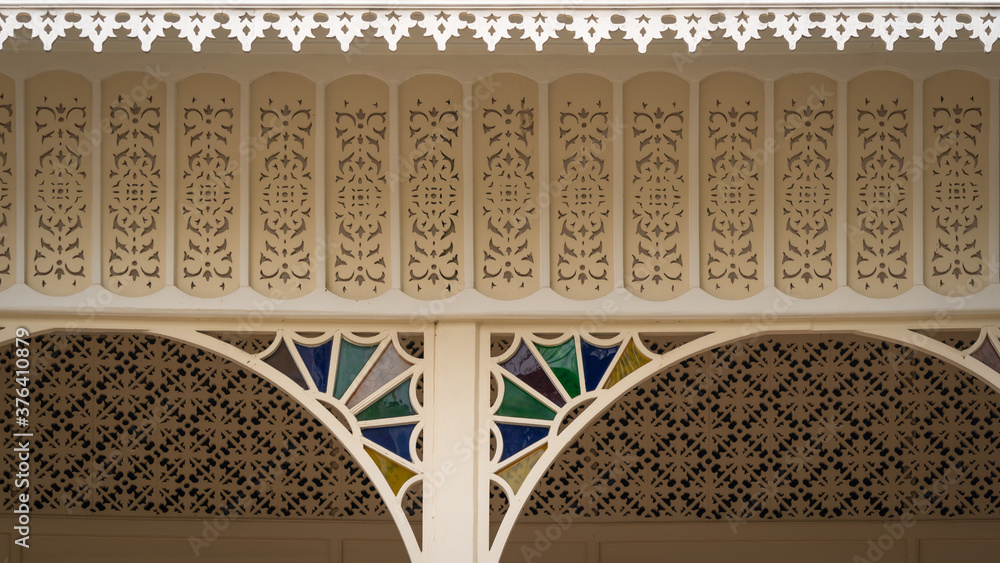 Poster Wooden eaves woodcut trellis panel stencil lattice engraving decorative panel oriental geometric pattern exterior architecture traditional oriental Mosque historical building