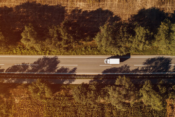 Top view of lorry truck on the road, aerial shot