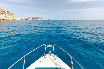 Clear sea from inflatable boat, summer time vacation mediterranean sea. Clear blue water from the...