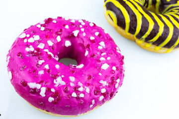 pink doughnut with sprinkles isolated