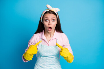 Portrait of astonished beautiful girl point index finger herself impressed she choice decision solution wear pink shirt isolated over blue color background