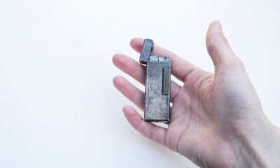 Holding a Patented Vintage Lighter Made in Switzerland 50's