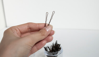 Product Photography Of Brown Hair Grips Sides Clips Hair Pins - obrazy, fototapety, plakaty
