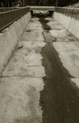City Canal Drainages to prevent floods. Concrete drainage channel for the transportation of sewage...