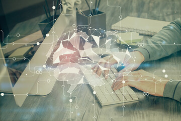 Man with computer background with brain theme hologram. Concept of brainstorm. Double exposure.