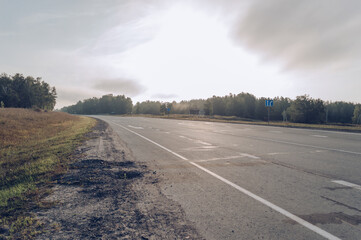 typical intercity road of siberia in the morning