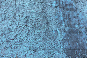 Texture of an old concrete wall. Dirty, worn weathered surface of a concrete wall