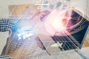 Multi exposure of technology hologram with man working on computer background. Concept of big data.