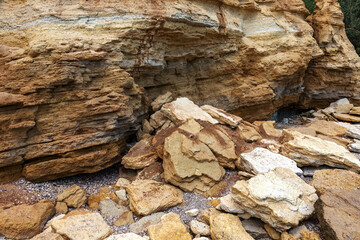 Landslide zone on Black Sea coast. Rock of sea rock shell. Zone of natural disasters during rainy season. Large masses of earth slip along slope of hill, destroy houses. Landslide - threat to life