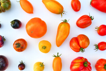 Colorful heirloom tomatoes background.