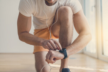 Handsome man working out at home