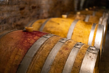 Wine in wooden barrels is stored. Wine cellar