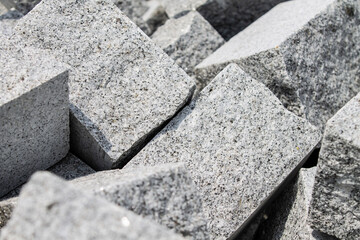 concrete block paving, pile of cobblestones, granite paving background