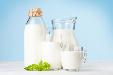 Milk in glass, bottle and jug