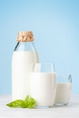 Milk in glass, bottle and jug