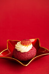 Dessert Shu cake on plate on red background