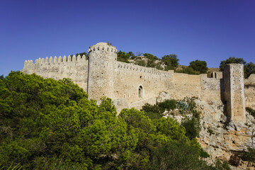 Fototapeta premium Castillo de Santueri, castillo medieval reconstruido sobre ruinas de una fortificación arabe del siglo XIV ,Felanitx,Mallorca.Islas Baleares. Spain.