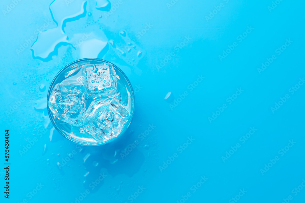 Sticker glass of water with ice cubes