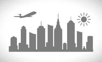 Fototapeta premium cityscape with plane and sun