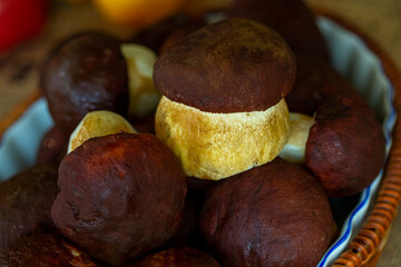 porcini mushrooms in a basket , autumn mushroom harvest