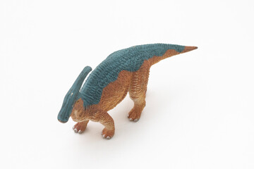 Toy dinosaur on white background