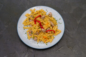 Italian pasta with meat, cheese, spices, parsley and red tomato sauce. Gourmet traditional food