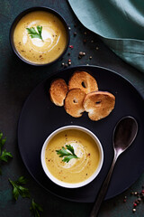 puree soup with coconut milk, ginger and pumpkin, with bread