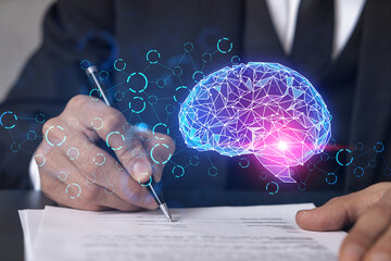 Businessman in suit signs contract. Double exposure with brain hologram. New partnership in it business concept.