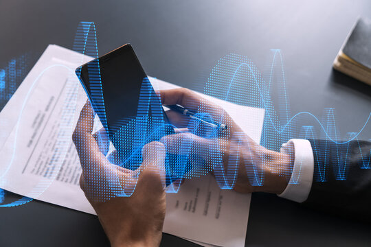 Businessman search and analyze using on-line app on phone. Financial graph hologram.