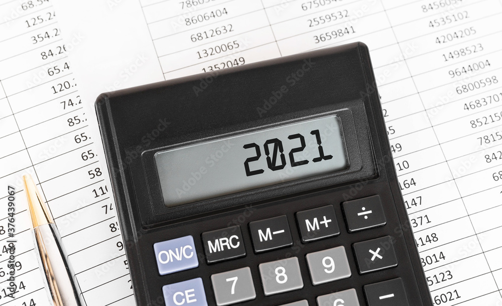 Poster calculator with the word 2021 on the display