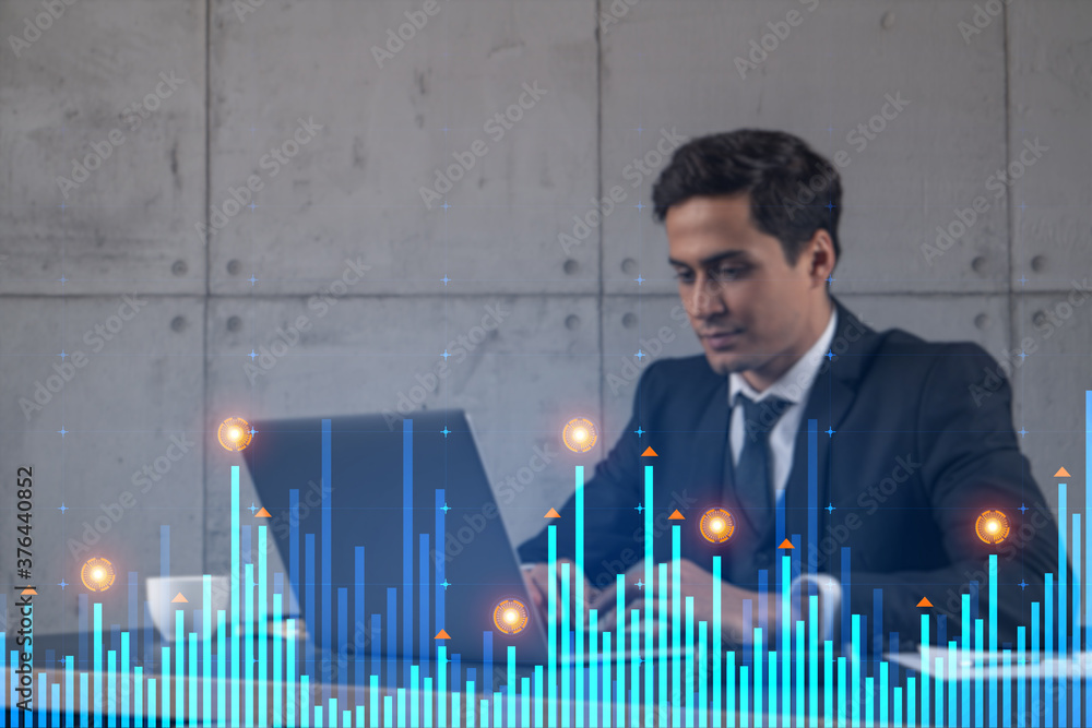 Poster businessman in office working with laptop technology online trading graph and chart, typing computer