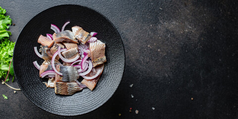 herring salad onion dressing snack seafood fish serving size natural top view place for text copy space keto or paleo diet raw pescetarian
