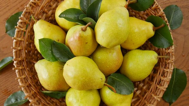 Ripe pears in a basket.