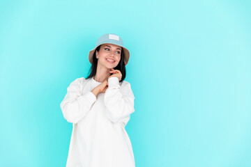 Fashion girl in blank sweatshirt jacket on a blue background