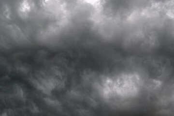 Dark dramatic cloudy overcast sky with thunderstorm clouds. Natural bad weather and climate sky...