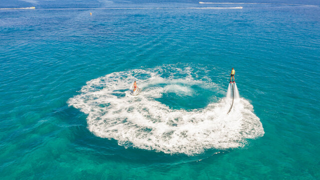 Fly boarding and sea riding in a sunny summer day, Zakynthos, Greece