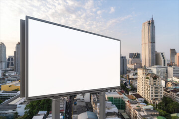 Fototapeta na wymiar Blank white road billboard with Bangkok cityscape background at sunset. Street advertising poster, mock up, 3D rendering. Side view. The concept of marketing communication to promote or sell idea.