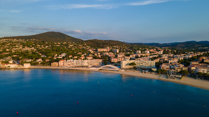 Fototapeta na wymiar Aerial view of Sainte-Maxime seafront and its famous bridge in French Riviera (South of France)