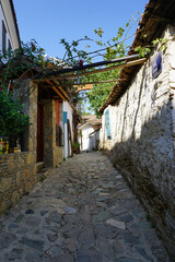 Fototapeta na wymiar Sirince Houses and narrow streets on a sunny day