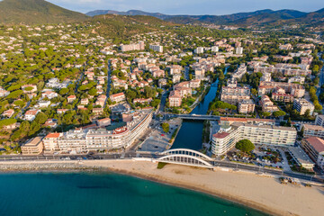 Obraz premium Aerial view of Sainte-Maxime seafront and its famous bridge in French Riviera (South of France)